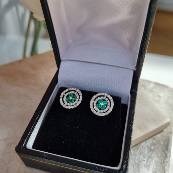 Emerald and diamond round cluster earrings in 18ct white gold