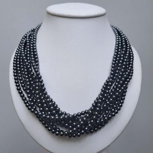 Pre Owned Tiffany and Co Hematite Bead Necklace, eight strands of rich hematite beads leading to a twisted silver hoop and T-bar clasp in Tiffany & Co pouch