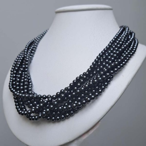 Pre Owned Tiffany and Co Hematite Bead Necklace, eight strands of rich hematite beads leading to a twisted silver hoop and T-bar clasp in Tiffany & Co pouch