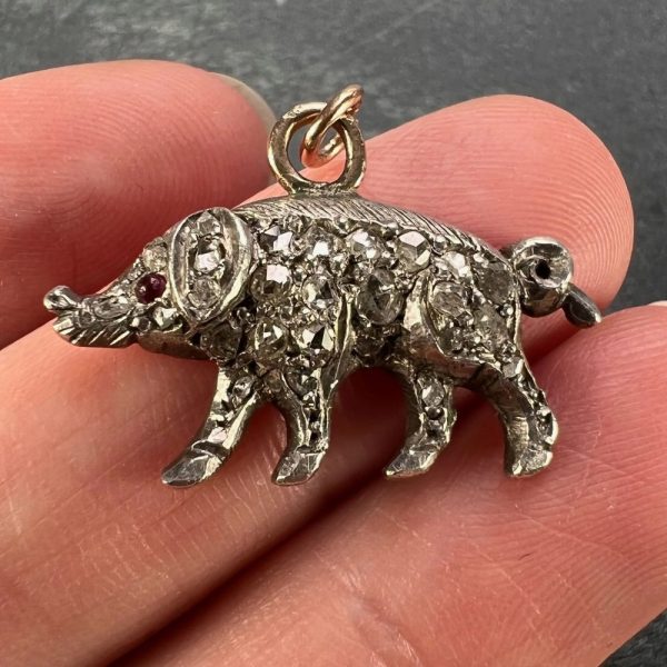 Antique Diamond Set Pig Charm Pendant in 18ct rose gold and silver set with 26 rose-cut diamonds and cabochon ruby eye, 0.40 carats