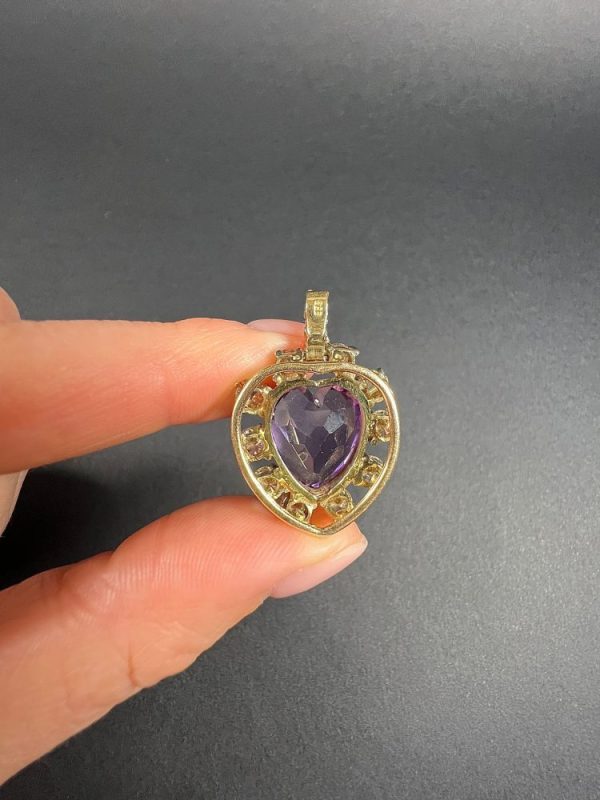 Antique Art Deco Heart Amethyst and Diamond Cluster Pendant, heart-shaped amethyst surrounded by halo of diamonds with diamond bail in 14ct yellow gold. Circa 1920s