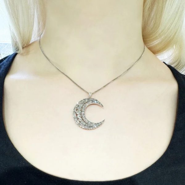 Victorian Antique Old Cut Diamond Crescent Moon Pendant, set with graduating rows of old-cut diamonds in silver-upon-gold, Circa 1890