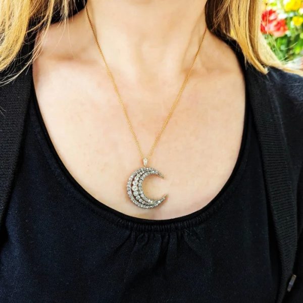 Victorian Antique Old Cut Diamond Crescent Moon Pendant, set with graduating rows of old-cut diamonds in silver-upon-gold, Circa 1890
