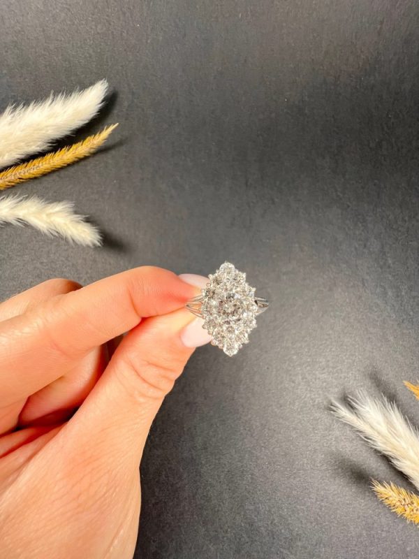 Vintage French 2ct Diamond Marquise Navette Cluster Ring, marquise navette-shaped body set with 2 carats of brilliant cut diamonds in 18ct white gold, with fancy split-shoulders and reeded band. Circa 1980s
