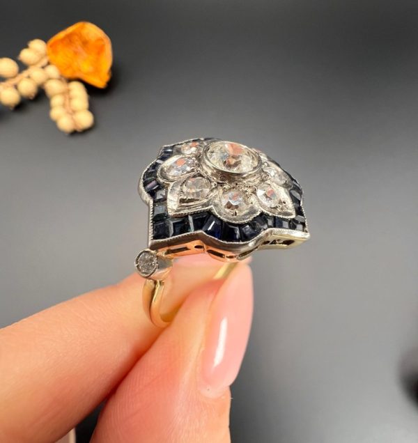 Vintage 1940s Old Cut Diamond and Calibre Sapphire Floral Cluster Engagement Ring in Platinum and 18ct Yellow Gold