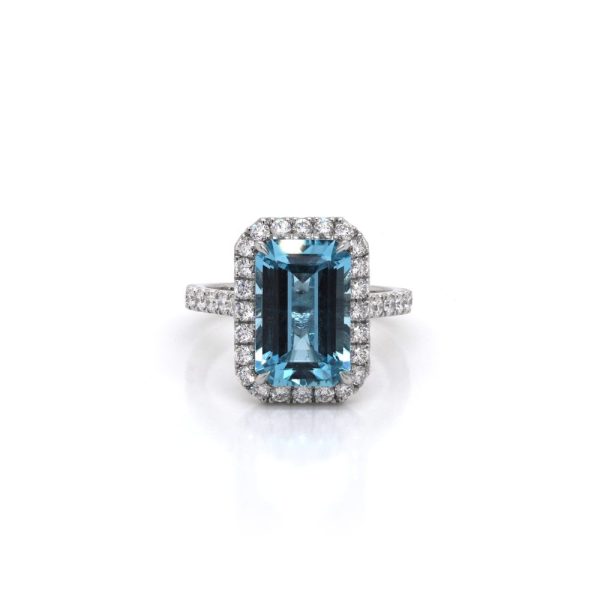 Aquamarine and diamond cluster ring in platinum.