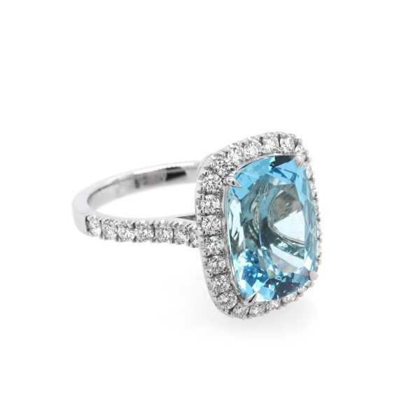 Aquamarine and diamond cluster ring in platinum.