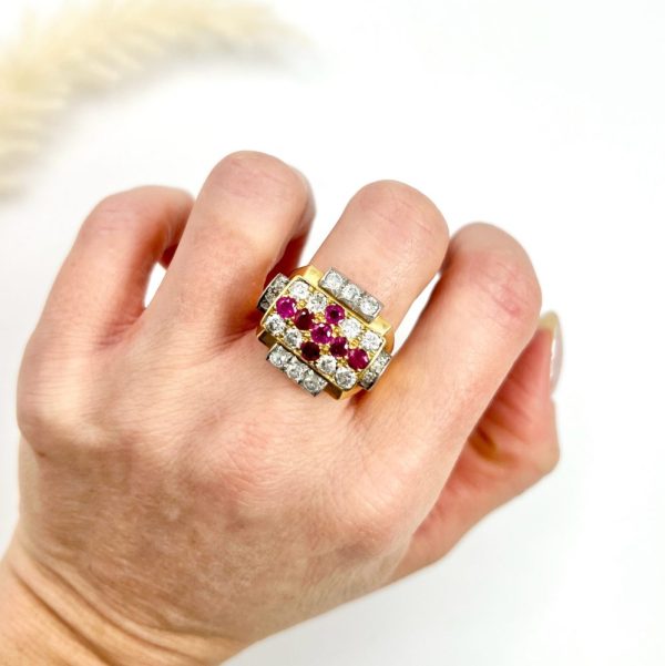 Late Art Deco French Ruby and Diamond Cross Tank Cocktail Ring, geometric statement ruby cross surrounded by sparkling diamonds with stepped shoulders in platinum to chunky 18ct yellow gold mount and band. Circa 1930s