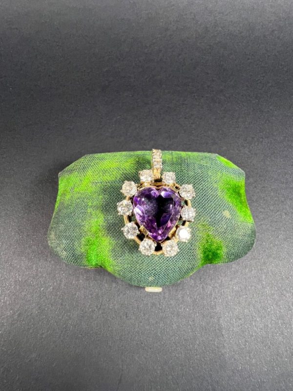 Antique Art Deco Heart Amethyst and Diamond Cluster Pendant, heart-shaped amethyst surrounded by halo of diamonds with diamond bail in 14ct yellow gold. Circa 1920s