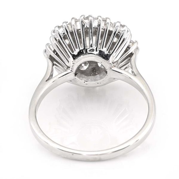Vintage 2.95ct Diamond Cluster Engagement Ring, 0.95ct old European-cut diamond surrounded by 2cts round brilliant-cut diamonds in floral and petal design in 18ct white gold. Circa 1950s