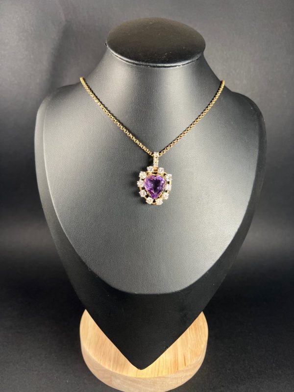 Antique Art Deco Heart Amethyst and Diamond Cluster Pendant, heart-shaped amethyst surrounded by halo of diamonds with diamond bail in 14ct yellow gold. Circa 1920s