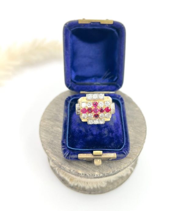 Late Art Deco French Ruby and Diamond Cross Tank Cocktail Ring, geometric statement ruby cross surrounded by sparkling diamonds with stepped shoulders in platinum to chunky 18ct yellow gold mount and band. Circa 1930s