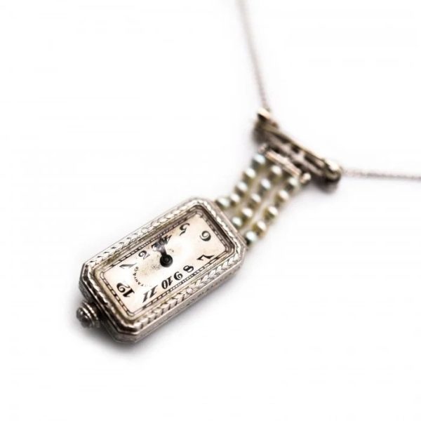 Tiffany and Co Art Deco 2.10ct Diamond Natural Pearl and Platinum Watch Pendant, Circa 1925. Movement signed C H Meylan