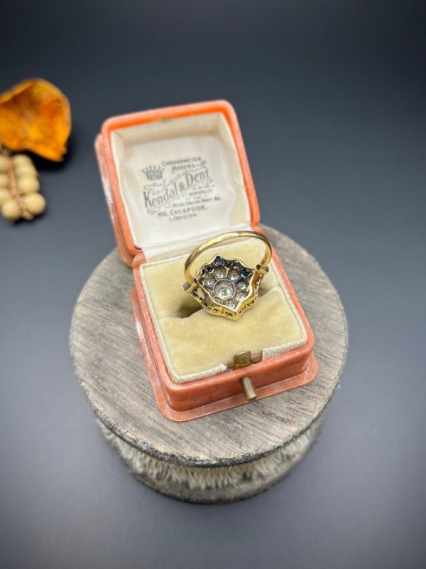 Vintage 1940s Old Cut Diamond and Calibre Sapphire Floral Cluster Engagement Ring in Platinum and 18ct Yellow Gold