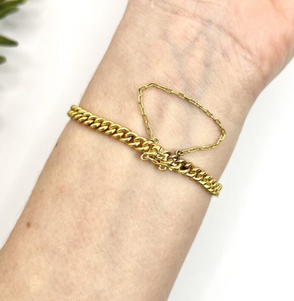Edwardian Antique Sapphire and Diamond Cluster Fancy Heart Link Gold Curb Bracelet, 18ct yellow gold curb link bracelet with central oval sapphire and diamond cluster flanked by diamond-set heart-shaped links, Circa 1900