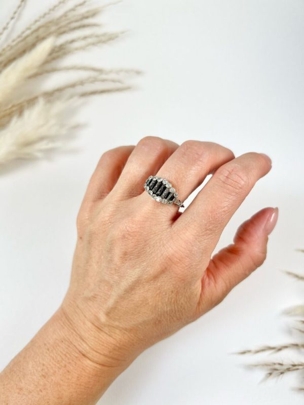 Art Deco Old Cut Diamond and Onyx Ring in Platinum, alternating bands of old-cut diamonds and black onyx with a decorative reeded band. Circa 1920s