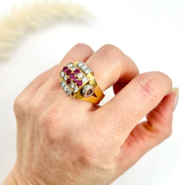 Late Art Deco French Ruby and Diamond Cross Tank Cocktail Ring, geometric statement ruby cross surrounded by sparkling diamonds with stepped shoulders in platinum to chunky 18ct yellow gold mount and band. Circa 1930s