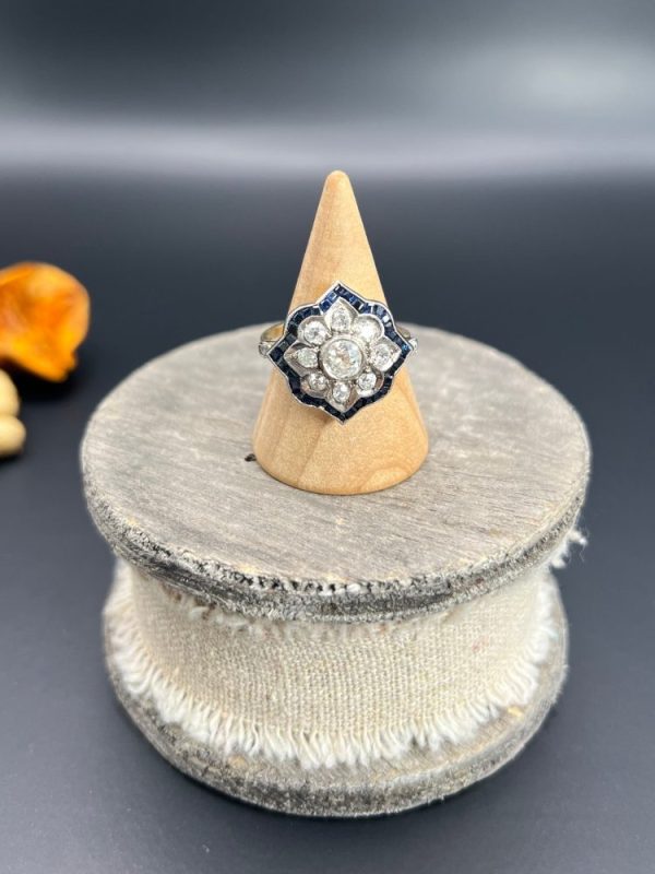Vintage 1940s Old Cut Diamond and Calibre Sapphire Floral Cluster Engagement Ring in Platinum and 18ct Yellow Gold