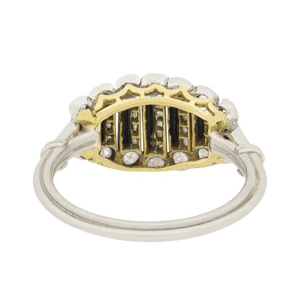 Art Deco Old Cut Diamond and Onyx Ring in Platinum, alternating bands of old-cut diamonds and black onyx with a decorative reeded band. Circa 1920s