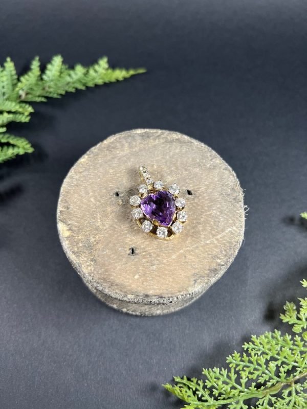 Antique Art Deco Heart Amethyst and Diamond Cluster Pendant, heart-shaped amethyst surrounded by halo of diamonds with diamond bail in 14ct yellow gold. Circa 1920s