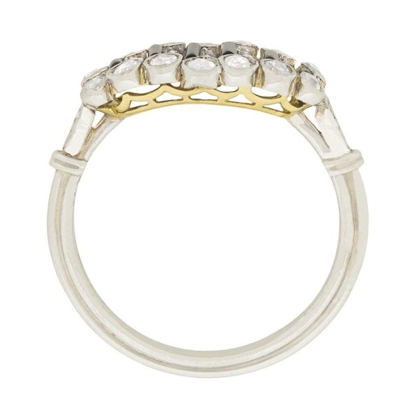 Art Deco Old Cut Diamond and Onyx Ring in Platinum, alternating bands of old-cut diamonds and black onyx with a decorative reeded band. Circa 1920s