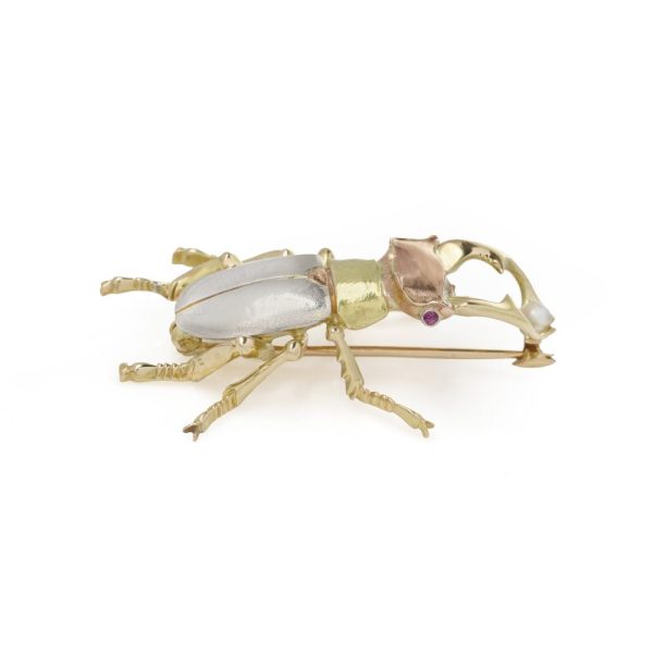 Vintage gold and platinum beetle brooch.