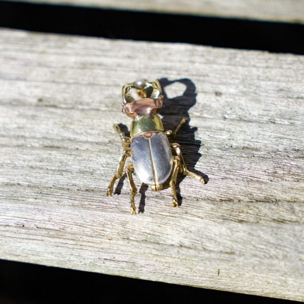 Vintage gold and platinum beetle brooch.