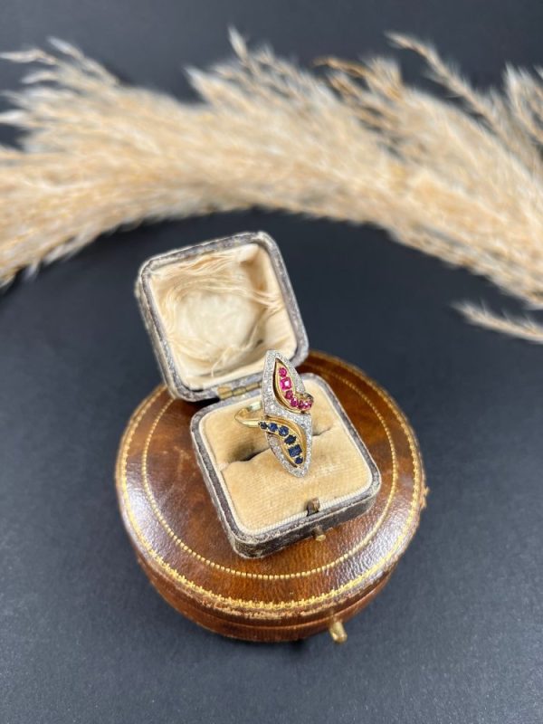 Vintage Ruby Sapphire Diamond Double Head Snake Navette Cluster Ring, marquise shaped diamond cluster ring with ruby and sapphire snake heads in 14ct gold. Circa 1950s