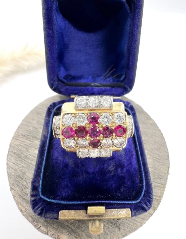 Late Art Deco French Ruby and Diamond Cross Tank Cocktail Ring, geometric statement ruby cross surrounded by sparkling diamonds with stepped shoulders in platinum to chunky 18ct yellow gold mount and band. Circa 1930s