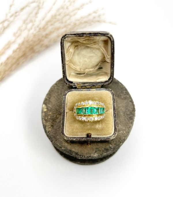 Vintage 1940s Emerald Five Stone Cluster Dress Ring in 18ct Yellow Gold, Five square step-cut emeralds framed top and bottom by a row of sparkling diamonds