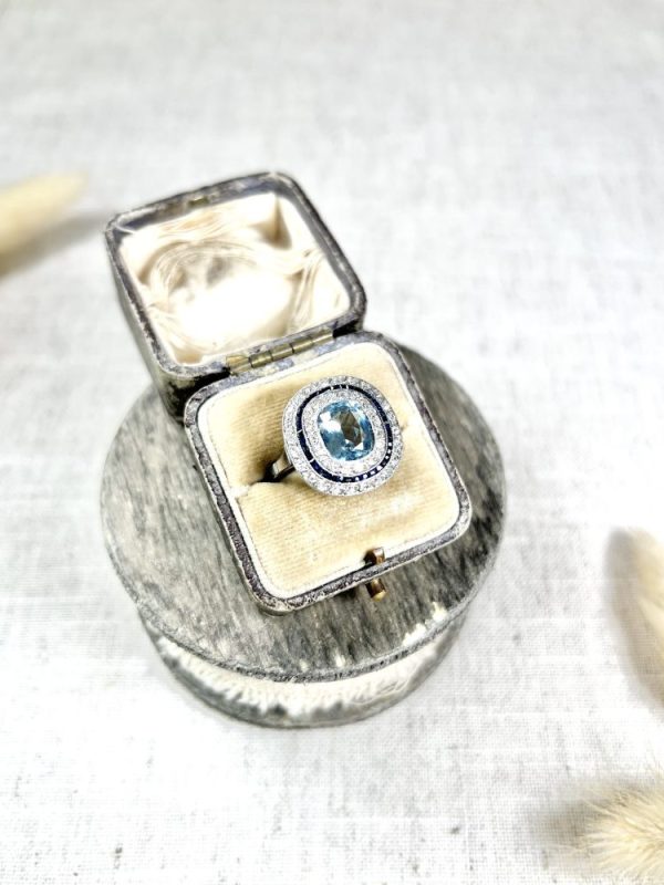 Edwardian Antique Cushion Cut Aquamarine Sapphire and Old Cut Diamond Double Halo Cluster Target Ring in platinum Circa 1910