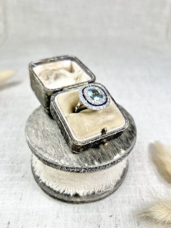 Edwardian Antique Cushion Cut Aquamarine Sapphire and Old Cut Diamond Double Halo Cluster Target Ring in platinum Circa 1910