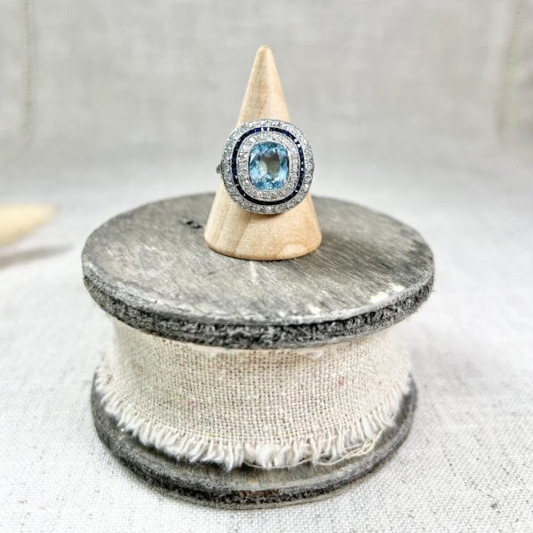 Edwardian Antique Cushion Cut Aquamarine Sapphire and Old Cut Diamond Double Halo Cluster Target Ring in platinum Circa 1910