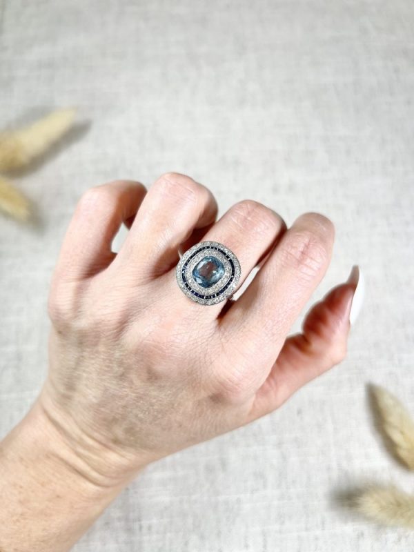 Edwardian Antique Cushion Cut Aquamarine Sapphire and Old Cut Diamond Double Halo Cluster Target Ring in platinum Circa 1910
