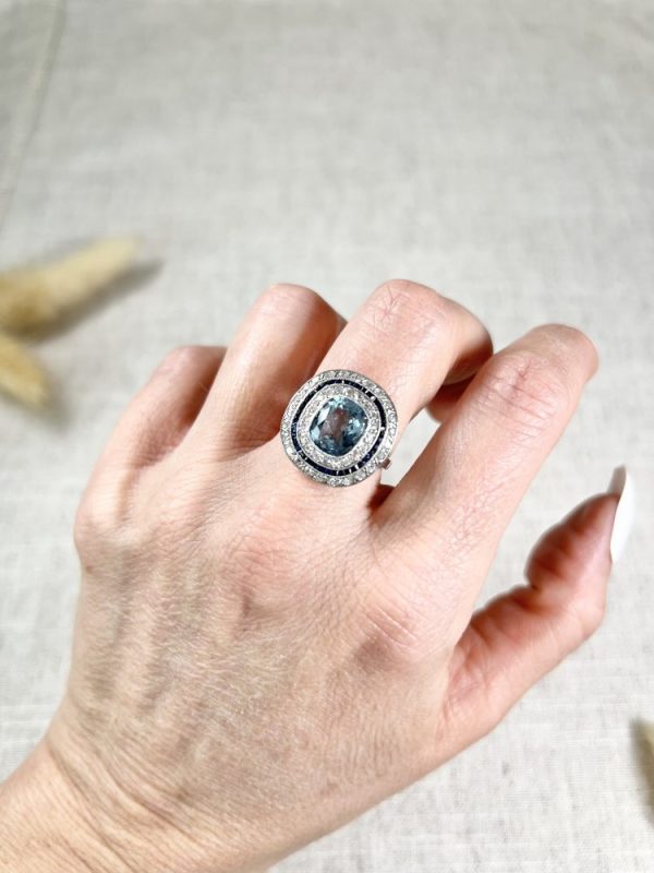 Edwardian Antique Cushion Cut Aquamarine Sapphire and Old Cut Diamond Double Halo Cluster Target Ring in platinum Circa 1910