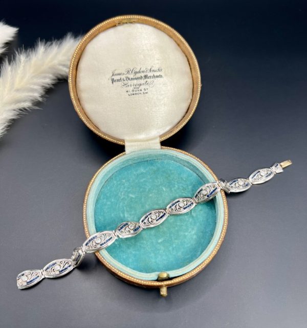 Edwardian Antique Old Cut Diamond and Sapphire Oval Fancy Link Bracelet, Each link set with old cut diamonds accented with calibre sapphire edges in platinum to 18ct yellow gold