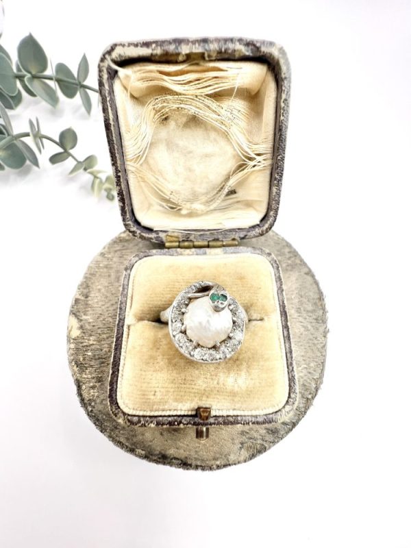 Edwardian Antique Pearl Emerald Diamond Snake Ring in Platinum, diamond-set snake coiled around pearl with emerald eyes in platinum, Circa 1910