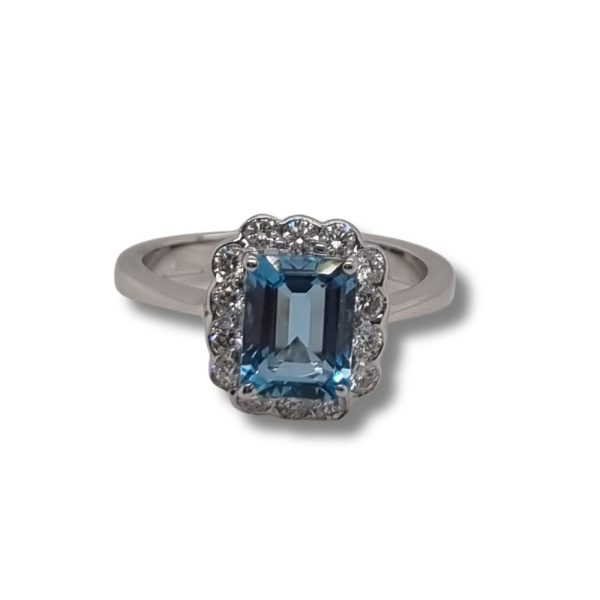 Aquamarine and diamond cluster ring set in 18ct white gold