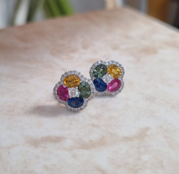 Fancy sapphire and diamond cluster earrings set in 18ct white gold