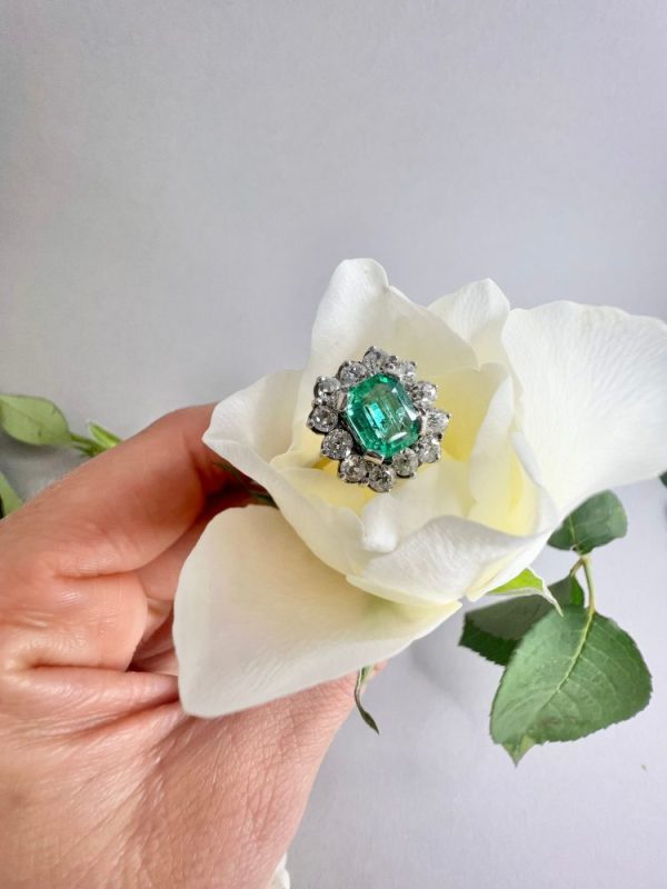 Vintage emerald ring diamond surround white gold claws