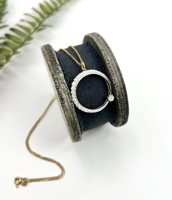Edwardian diamond crescent moon pendant in white gold.