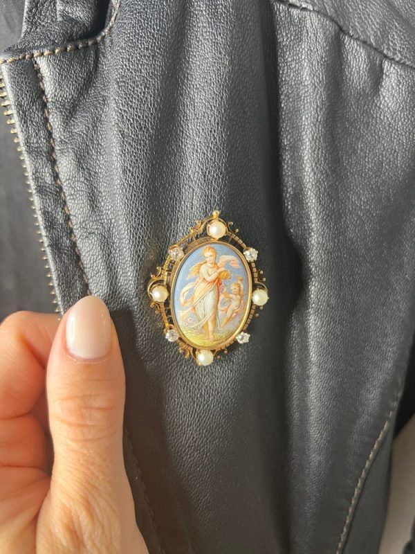 Antique enamel, pearl and diamond portrait brooch in gold.