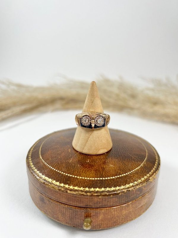 Vintage owl cocktail ring in rose gold with diamonds and sapphires.