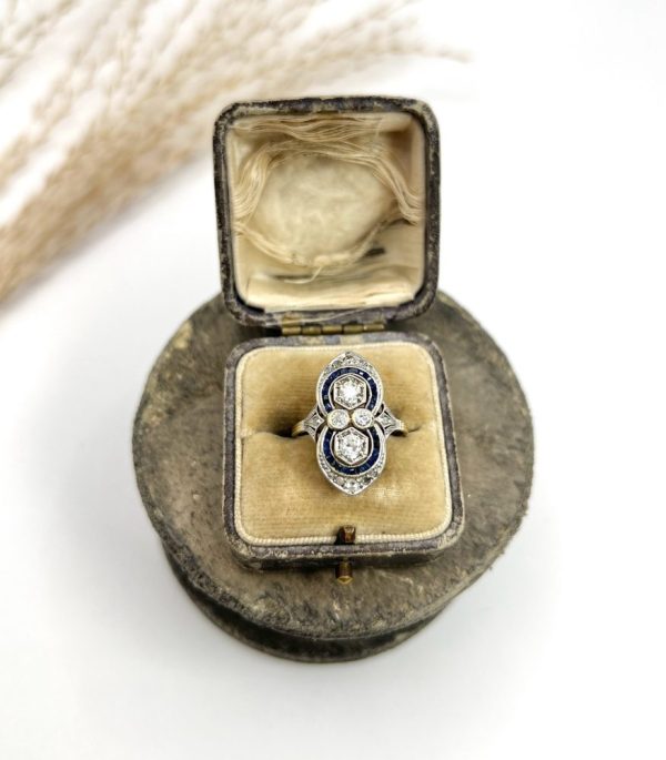 Art Deco diamond and sapphire ring in platinum and gold.