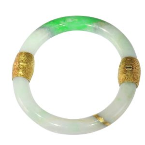 Victorian jade bangle with gold fittings.