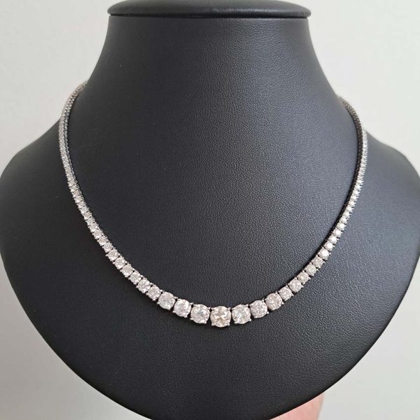 Diamond Line Tennis Necklace, 10.52 carats of graduated round brilliant-cut diamonds four-claw set and mounted in 18ct white gold