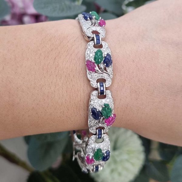 Multi Gemstone Sapphire Ruby Emerald and 4.50ct Diamond Tutti Frutti Bracelet in 18ct White gold, each diamond panel with hand carved cabochon Emerald, Ruby and Sapphire in leaf design