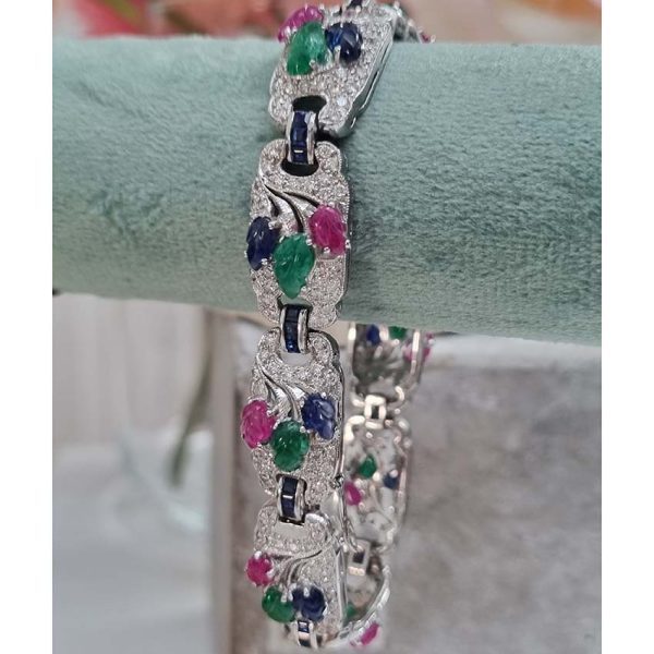 Multi Gemstone Sapphire Ruby Emerald and 4.50ct Diamond Tutti Frutti Bracelet in 18ct White gold, each diamond panel with hand carved cabochon Emerald, Ruby and Sapphire in leaf design