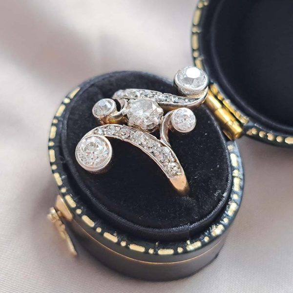Victorian Antique Old Cut Diamond Ring, central old cut diamond set within curved diamond-set shoulders with larger diamond accents