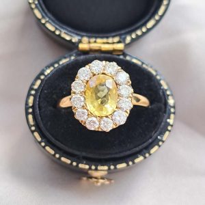 2ct Oval Yellow Sapphire and Diamond Cluster Engagement Ring